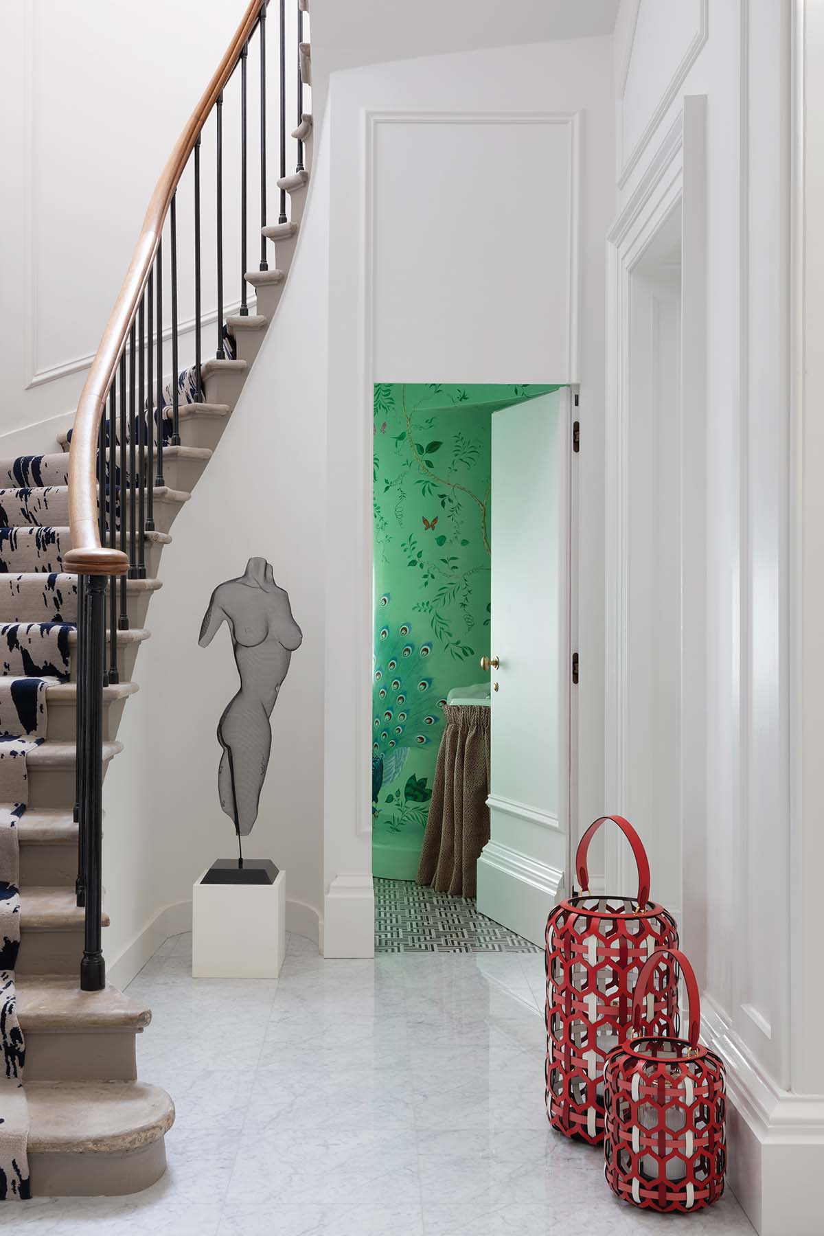 white and black stairwell, cruella de vile interiors, green bathroom, bathroom mural, wall mural, hand painted wall mural