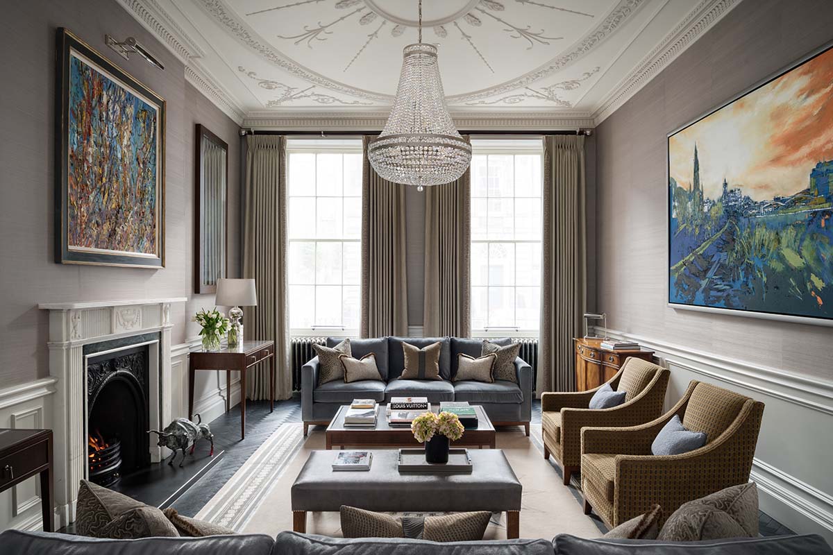 townhouse-living-room-bay-windows-shutters-charlotte-james-brown-chairs-fireplace-elegant-interior-design