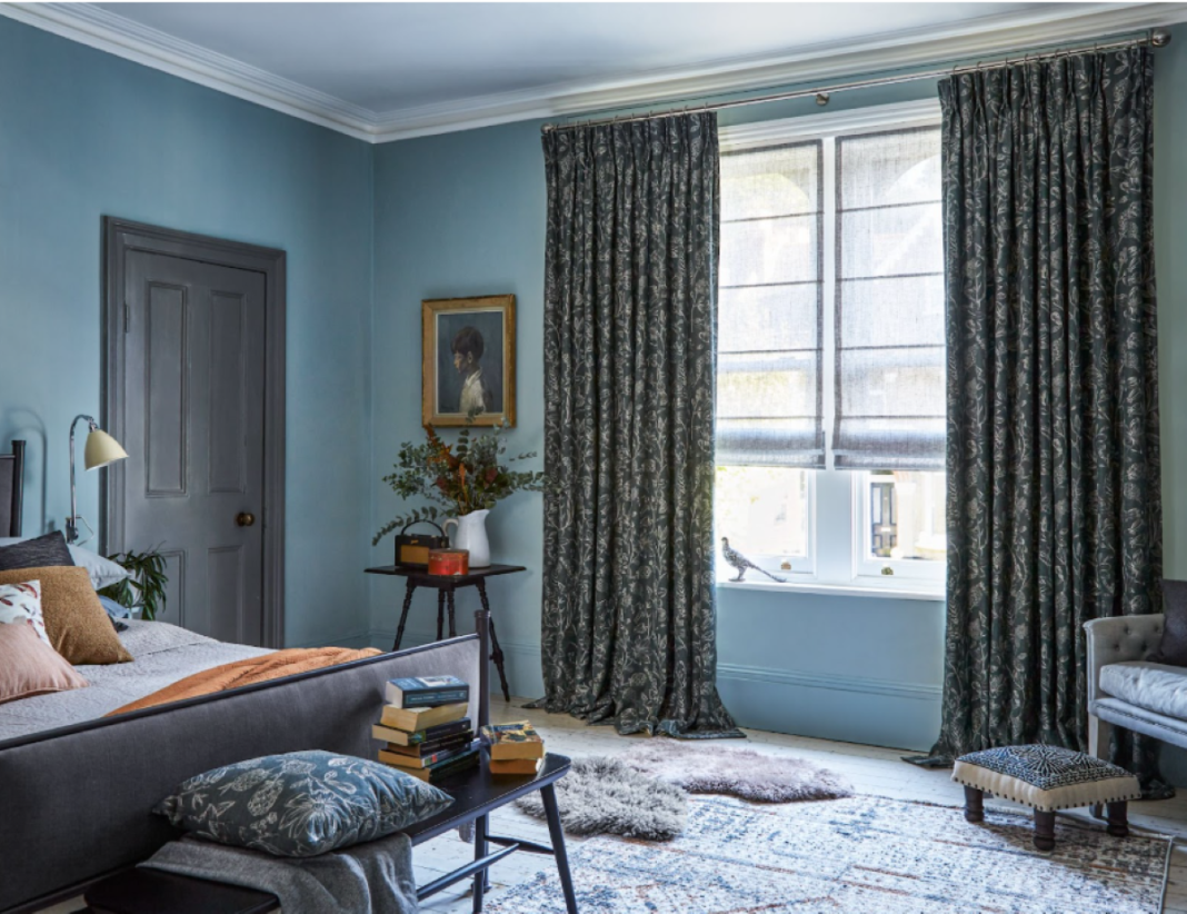 blue living room with blue curtains and blue walls; colour drenched blue room