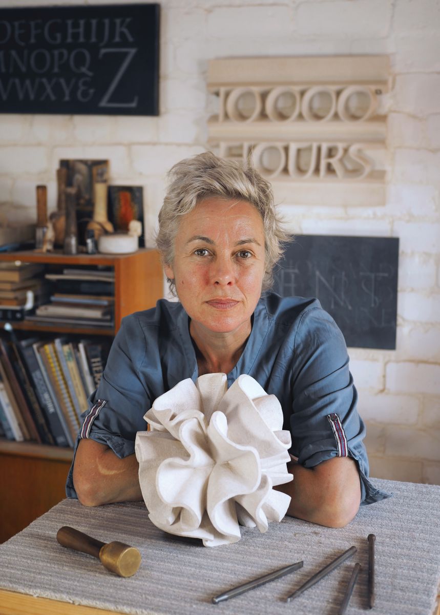 Sculptor Michelle de Bruin in her studio