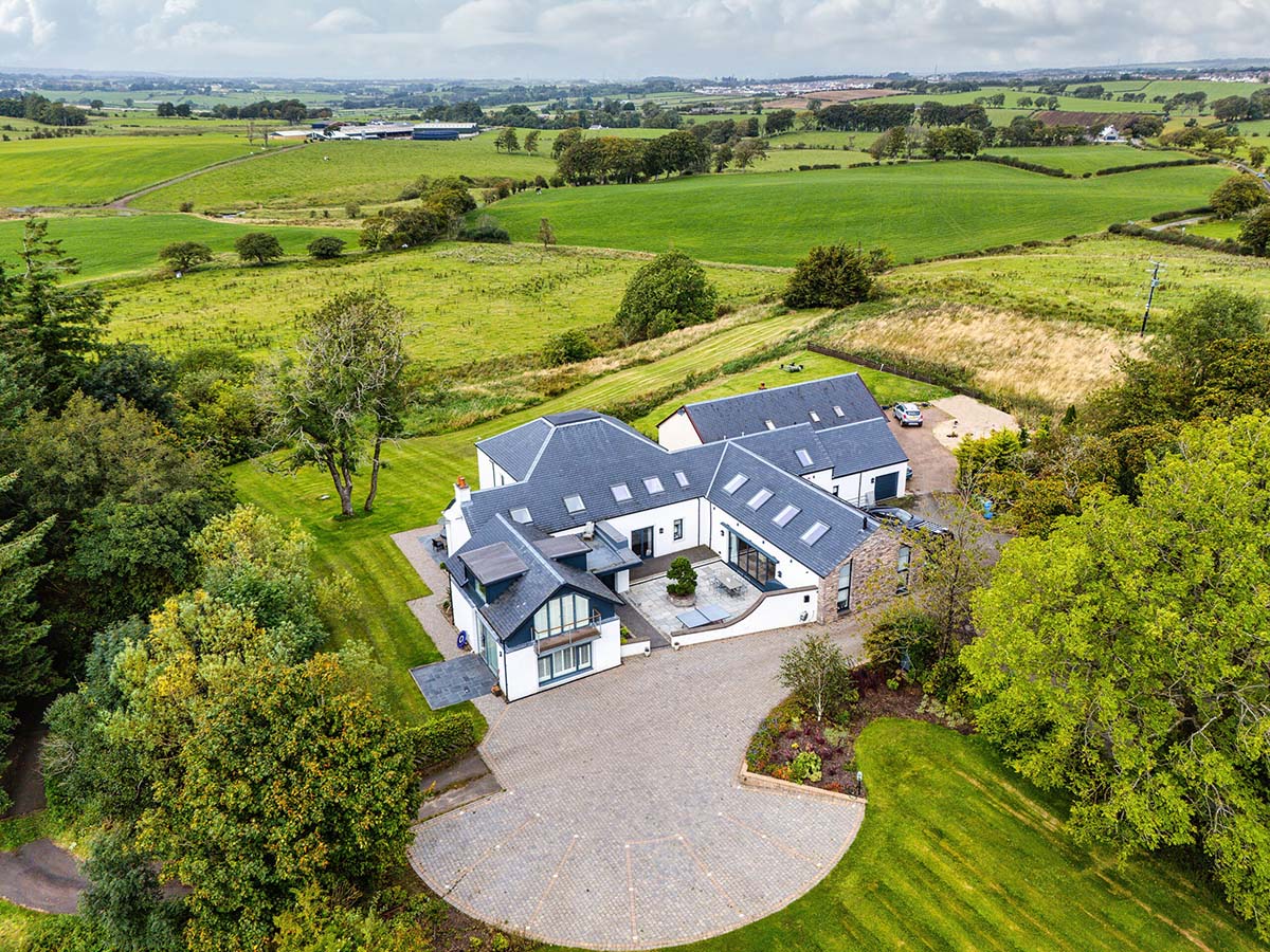 Craigend Farm, white cottage extended in the Scottish countryside