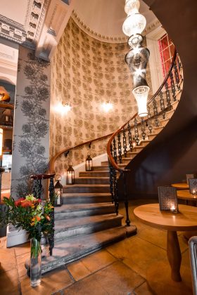 winding staircase in grand hotel