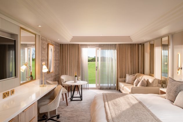 cream bedroom in a scottish rural hotel with white curtains, white carpet, white duvet sheets and scandi inspired furniture - one of Scotland's best luxury hotels, cottages and cabins