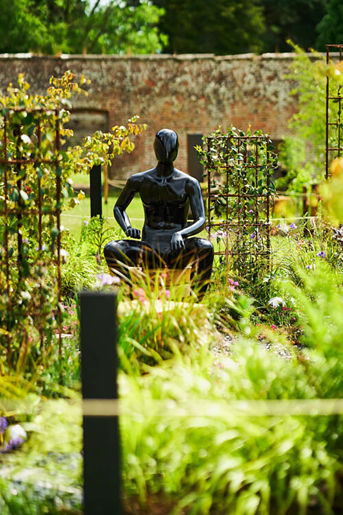 scone palace gardens with black sculpture 