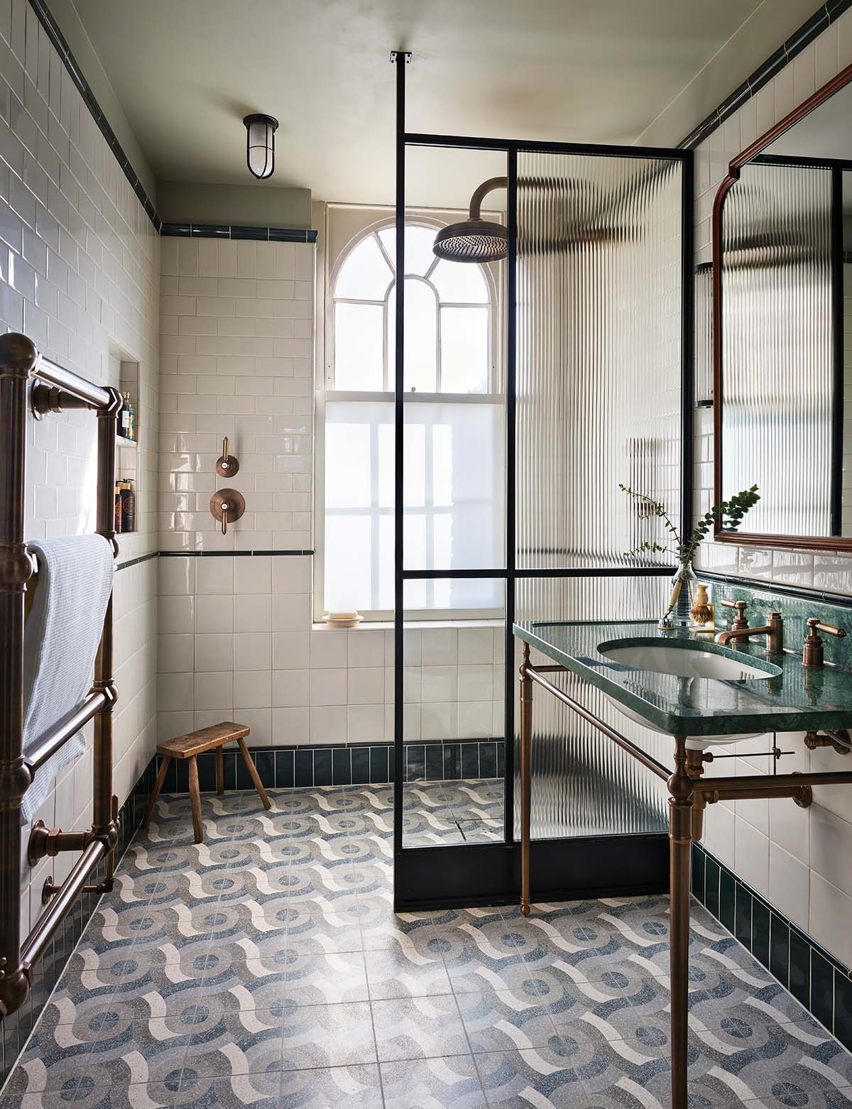 This light-filled bathroom features a reeded shower screen in a project by Drummond Bathrooms; a feature on designing with glass