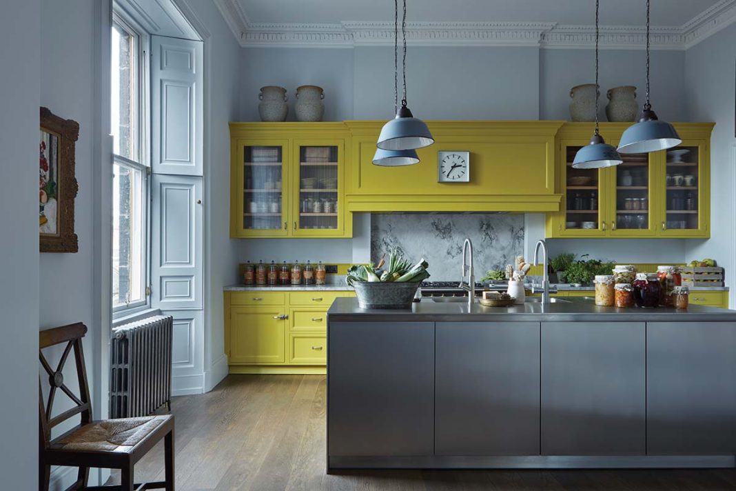 designed by Hubert Zandberg: yellow kitchen, green kitchen wuth blue walls and grey breakfast bar and cabinetry