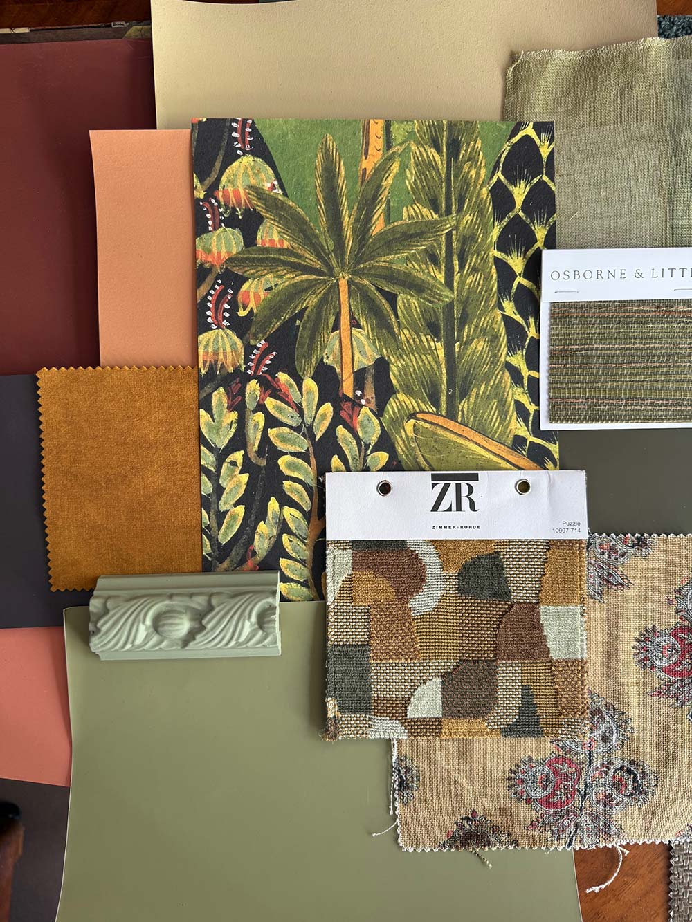 A forest green home swatch featuring Zimmer + Rohde textiles and Osborn & Little wallpaper, collated by colour consultant Fiona De Lys