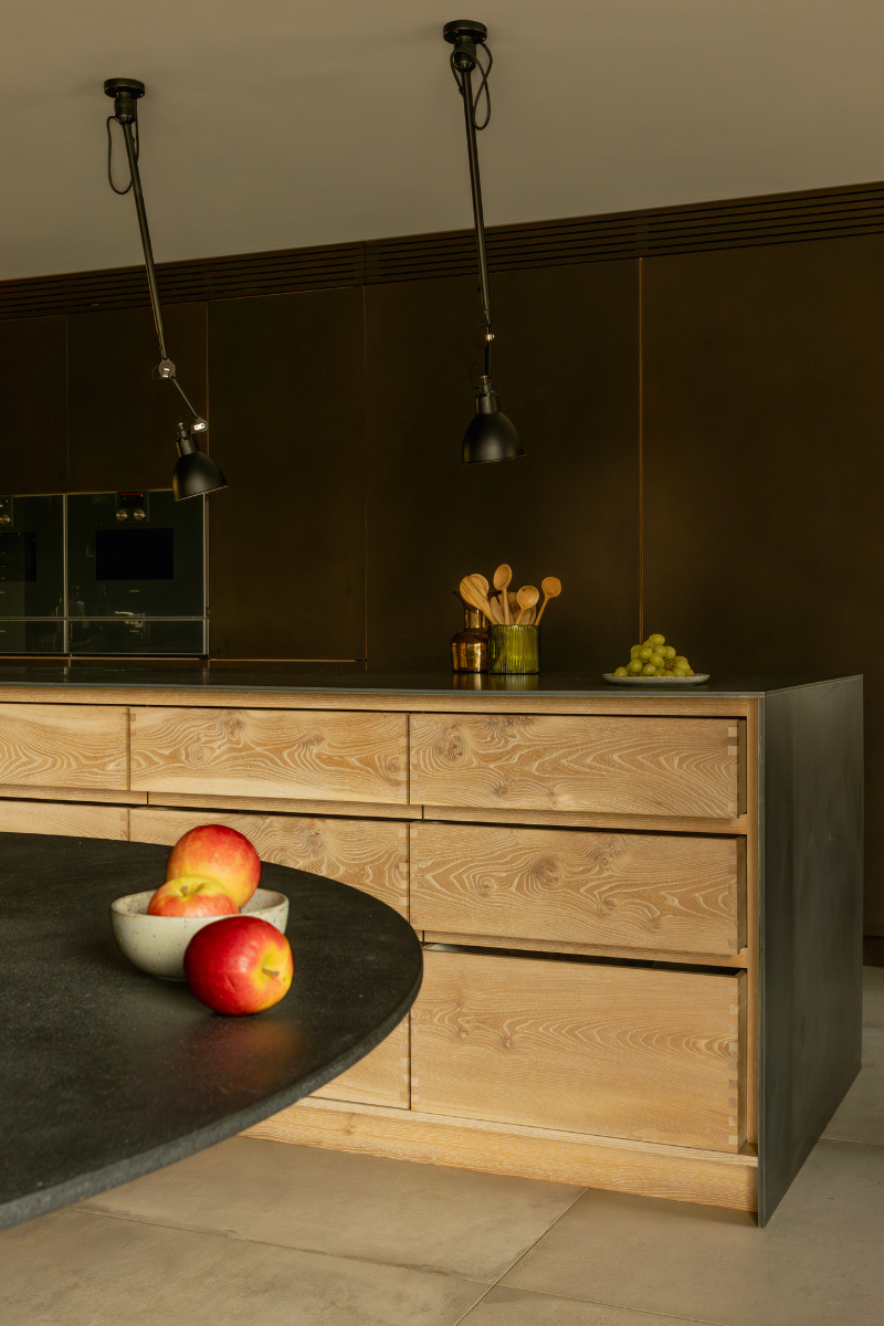 Colin Parker Furniture made these brown drawers and cabinets in a kitchen in scotland