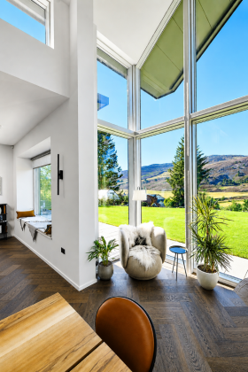 windows with white windowpanes and view to garden