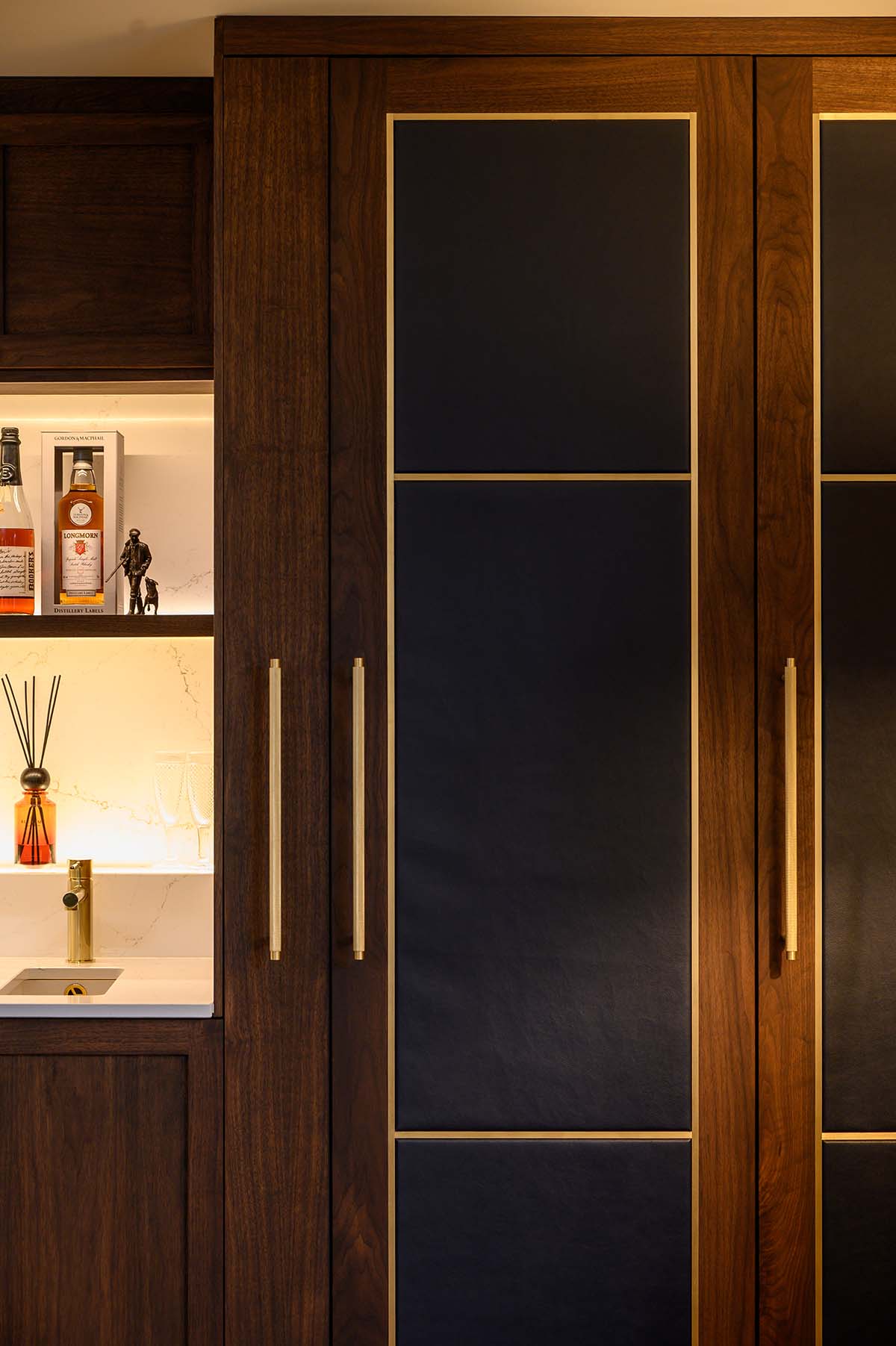 sleek cabinetry of a scottish home int he highlands made by Laurel & Wood