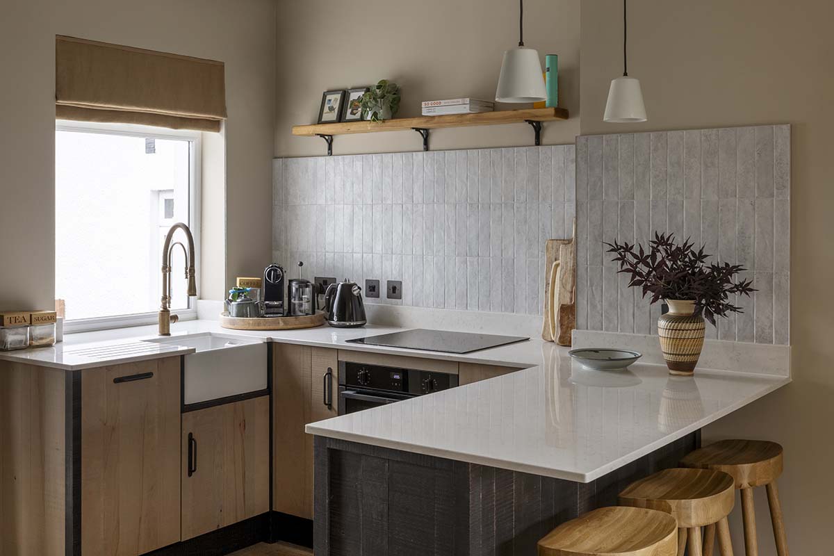 oak and white tile kitchen in a scottish home int he highlands made by Laurel & Wood