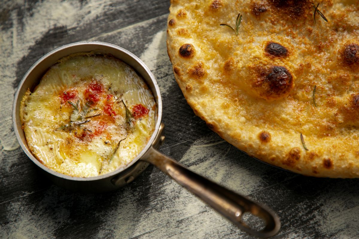 Whole baked brie with chilli, garlic, rosemary, bianco focaccia