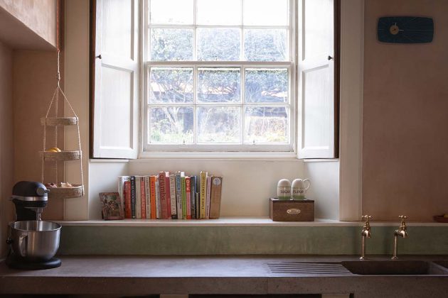 nicholas denney studio designs the concrete surfaces in this rural pink kitchen