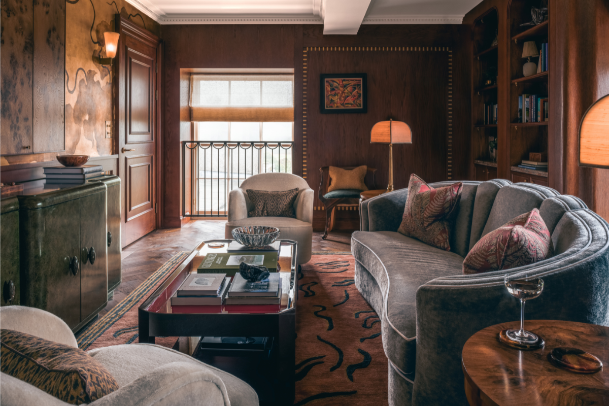Sitting room features second painted mural by Nancy Daniell 