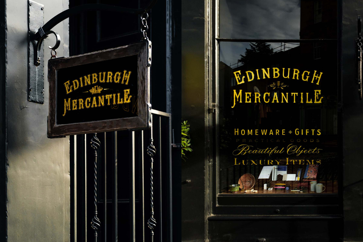 exterior signage at edinburgh mercantile; yellow text on black background